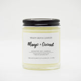 straight sided glass jar candle with black twist off metal lid and white label